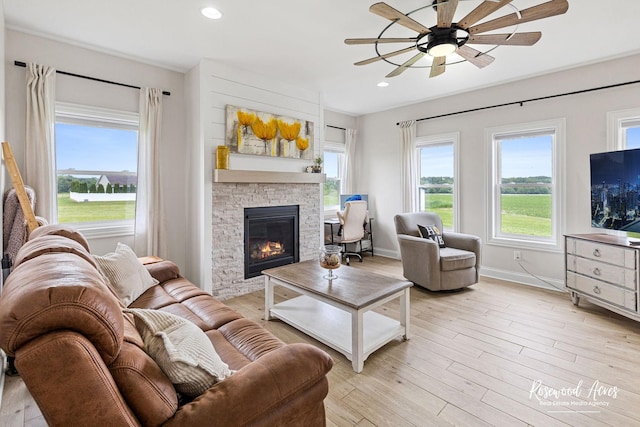 1405 Navajo Ct, Kankakee, IL 60901 - living area with a ceiling fan, a fireplace, light wood-style floors, baseboards, and recessed lighting