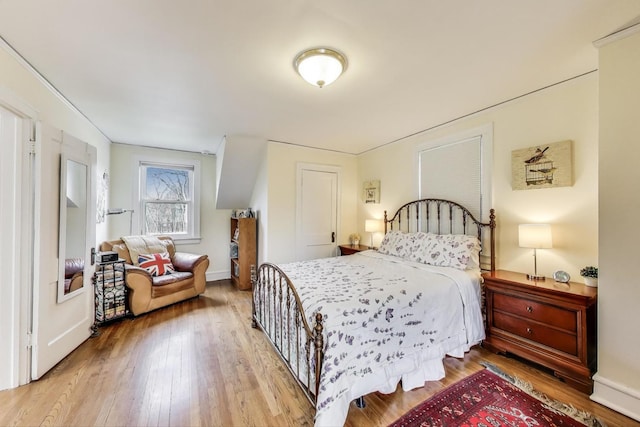 1314 Saint Johns Ave, Highland Park, IL 60035 - bedroom featuring wood finished floors and baseboards