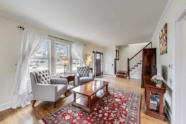 1314 Saint Johns Ave, Highland Park, IL 60035 - living area with crown molding, stairs, light wood finished floors, and baseboards