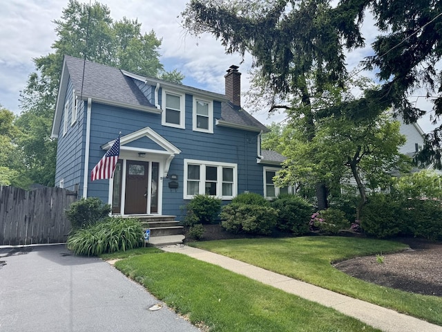 1314 Saint Johns Ave, Highland Park, IL 60035 - view of front of property featuring a chimney and a shingled roof