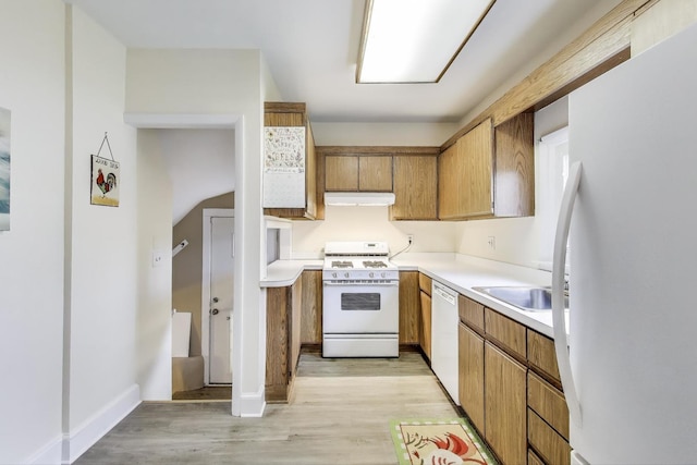 1314 Saint Johns Ave, Highland Park, IL 60035 - kitchen featuring white appliances, under cabinet range hood, light wood-type flooring, and light countertops
