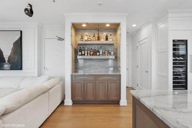 1155 N Dearborn St Unit 1301, Chicago, IL 60610 - indoor dry bar featuring beverage cooler, light wood-style floors, recessed lighting, and crown molding
