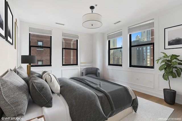 1155 N Dearborn St Unit 1301, Chicago, IL 60610 - bedroom featuring wood finished floors