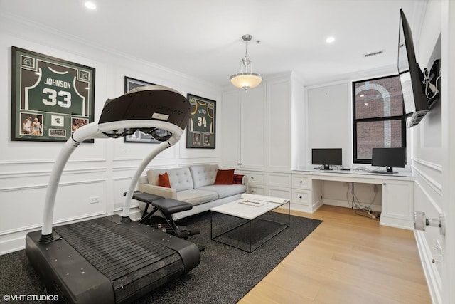1155 N Dearborn St Unit 1301, Chicago, IL 60610 - living room with a decorative wall, ornamental molding, light wood-type flooring, and recessed lighting