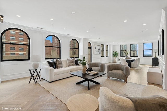 1155 N Dearborn St Unit 1301, Chicago, IL 60610 - living room with recessed lighting, a decorative wall, and crown molding