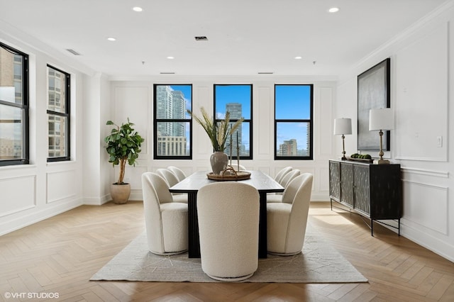 1155 N Dearborn St Unit 1301, Chicago, IL 60610 - dining space featuring healthy amount of natural light, recessed lighting, a decorative wall, and ornamental molding