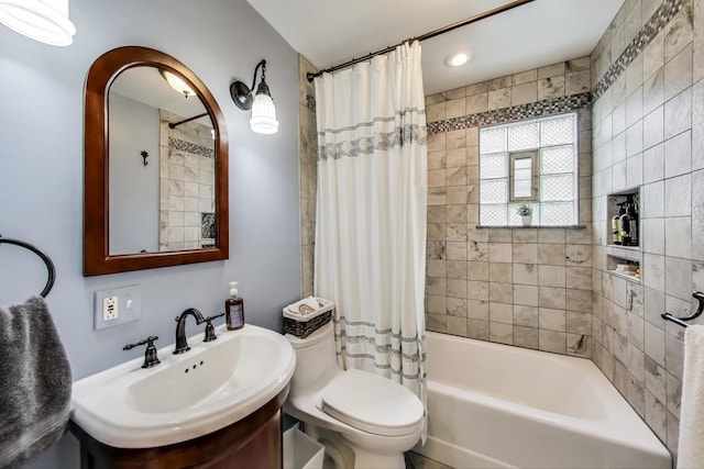 1350 Saint Johns Ave, Highland Park, IL 60035 - bathroom featuring toilet, shower / tub combo with curtain, and a sink