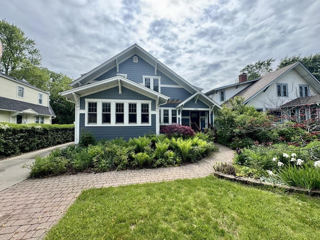 1350 Saint Johns Ave, Highland Park, IL 60035 - rear view of house with a lawn