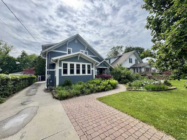 1350 Saint Johns Ave, Highland Park, IL 60035 - view of front of house with concrete driveway and a front yard
