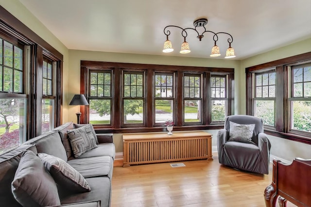 1350 Saint Johns Ave, Highland Park, IL 60035 - sunroom / solarium featuring radiator heating unit