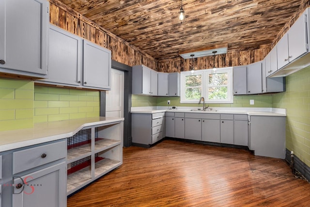 455 Sylvan Ave, Grand Ridge, IL 61325 - kitchen featuring gray cabinets, dark wood-type flooring, a sink, wood ceiling, and light countertops