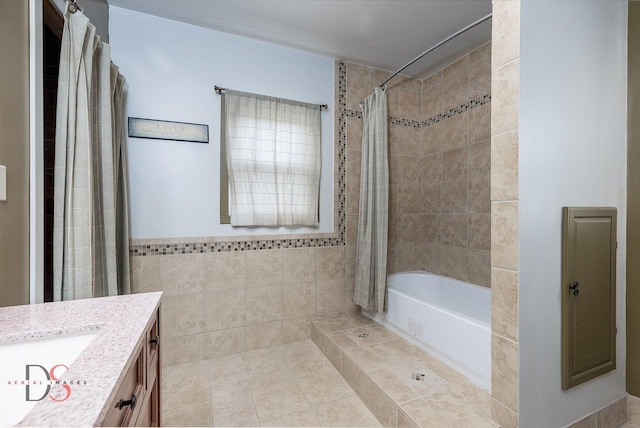 455 Sylvan Ave, Grand Ridge, IL 61325 - full bathroom featuring vanity, shower / bath combo with shower curtain, and tile walls
