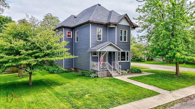 455 Sylvan Ave, Grand Ridge, IL 61325 - victorian house featuring a front lawn and roof with shingles