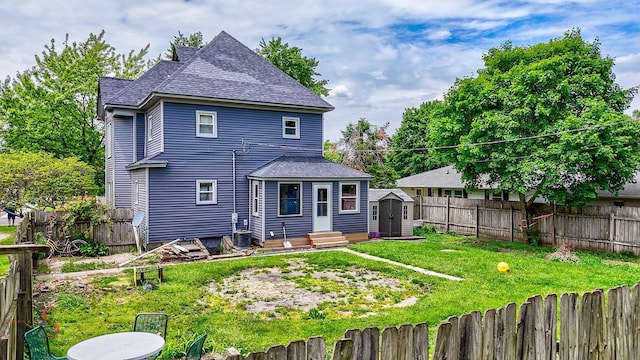 455 Sylvan Ave, Grand Ridge, IL 61325 - rear view of house featuring roof with shingles and central AC unit