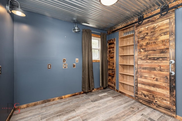 455 Sylvan Ave, Grand Ridge, IL 61325 - unfurnished room with wood finished floors and baseboards