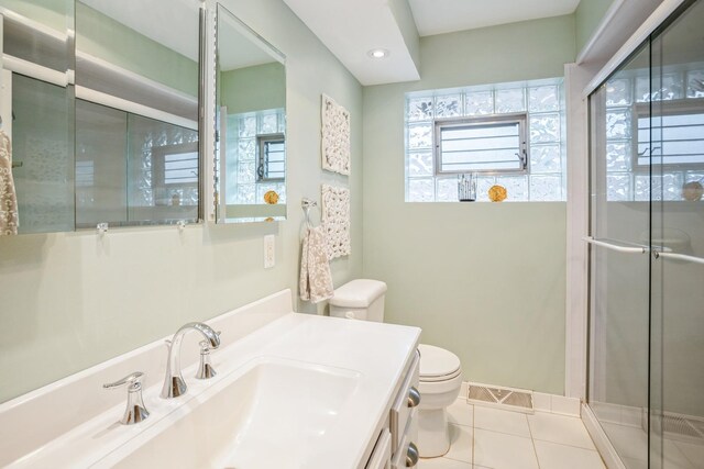 430 Florian Dr, Des Plaines, IL 60016 - full bathroom featuring tile patterned flooring, vanity, and a shower stall