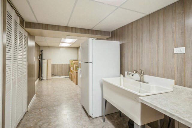 430 Florian Dr, Des Plaines, IL 60016 - washroom with wood walls and a sink