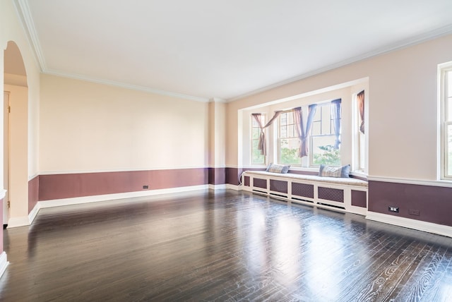 5000 S Cornell Ave Unit 3A, Chicago, IL 60615 - spare room with arched walkways, crown molding, and wood finished floors