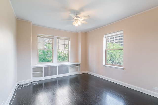 5000 S Cornell Ave Unit 3A, Chicago, IL 60615 - spare room with dark wood-style floors, plenty of natural light, a ceiling fan, and crown molding