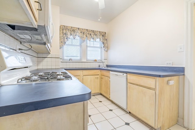 5000 S Cornell Ave Unit 3A, Chicago, IL 60615 - kitchen featuring light brown cabinets, dishwasher, light floors, dark countertops, and range