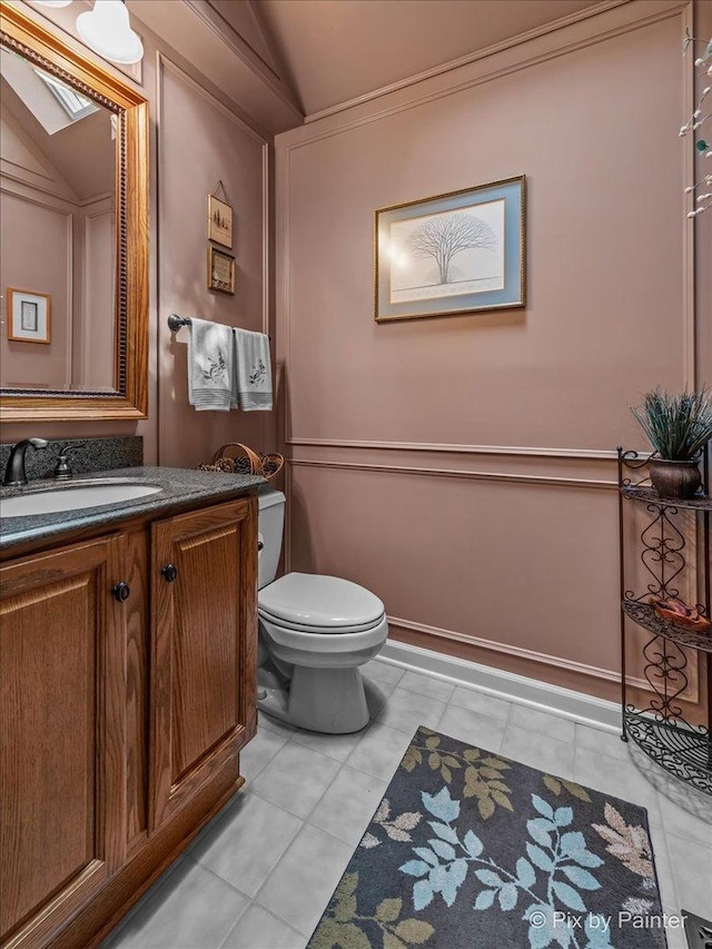 5N538 Hidden Springs Dr, Saint Charles, IL 60175 - bathroom featuring vanity, vaulted ceiling, and tile patterned flooring