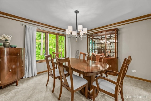 5N538 Hidden Springs Dr, Saint Charles, IL 60175 - dining space featuring a chandelier, light colored carpet, and ornamental molding