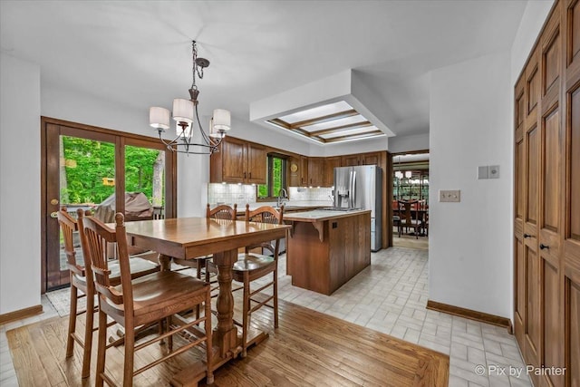 5N538 Hidden Springs Dr, Saint Charles, IL 60175 - dining room with a chandelier and baseboards