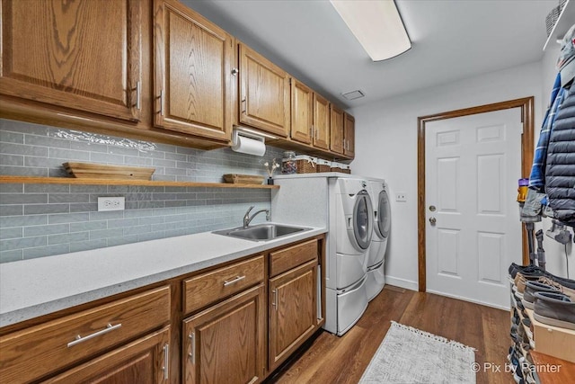 5N538 Hidden Springs Dr, Saint Charles, IL 60175 - washroom featuring washer and clothes dryer, cabinet space, and dark wood-type flooring