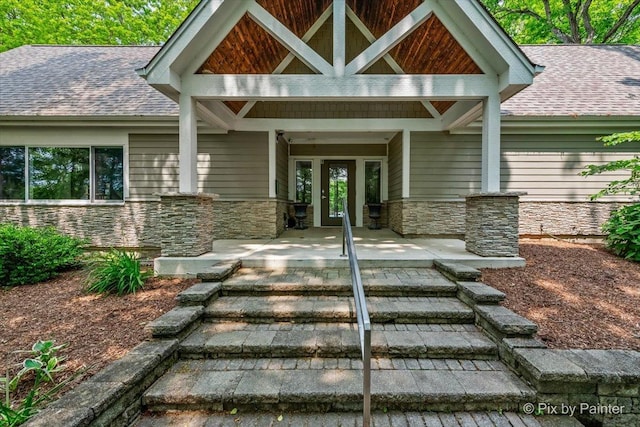 5N538 Hidden Springs Dr, Saint Charles, IL 60175 - entrance to property featuring stone siding, french doors, and a shingled roof