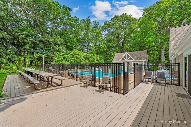 5N538 Hidden Springs Dr, Saint Charles, IL 60175 - wooden deck featuring view of wooded area, an outdoor structure, and outdoor dining space