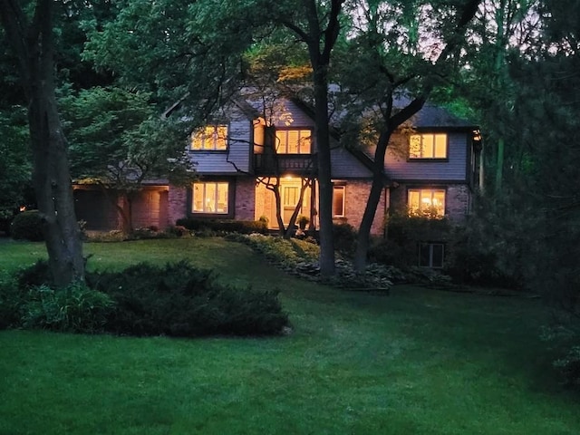 5N538 Hidden Springs Dr, Saint Charles, IL 60175 - rear view of property with a yard and brick siding