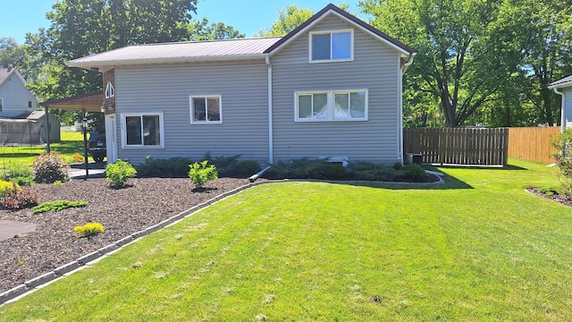 306 N Joy St, Tampico, IL 61283 - view of side of home featuring metal roof