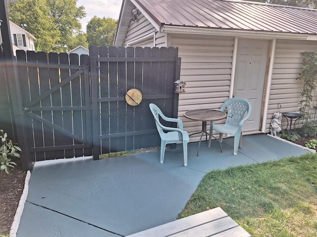 306 N Joy St, Tampico, IL 61283 - view of patio / terrace with a gate