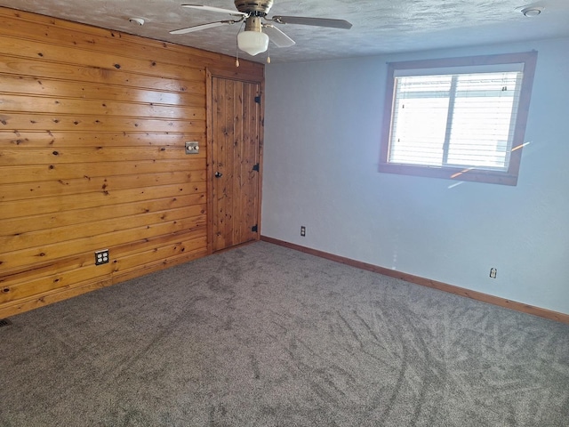 306 N Joy St, Tampico, IL 61283 - unfurnished room with a ceiling fan, carpet flooring, and baseboards