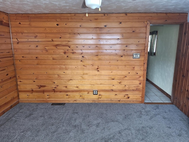 306 N Joy St, Tampico, IL 61283 - tiled empty room with carpet and baseboards