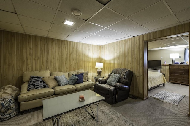 1851 Salem Ct, Gurnee, IL 60031 - living area featuring a paneled ceiling, carpet floors, and wood walls