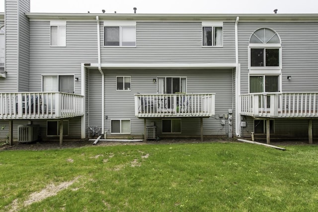 1851 Salem Ct, Gurnee, IL 60031 - back of property with central air condition unit, a yard, and a wooden deck