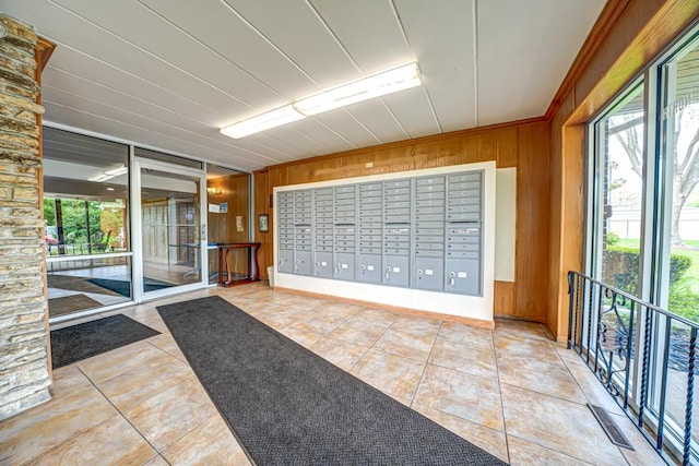 127 N Wolf Rd Unit 63A, Wheeling, IL 60090 - view of property's community featuring mail area and wood walls
