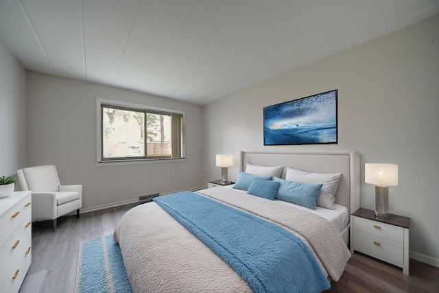 127 N Wolf Rd Unit 63A, Wheeling, IL 60090 - bedroom with wood finished floors and baseboards