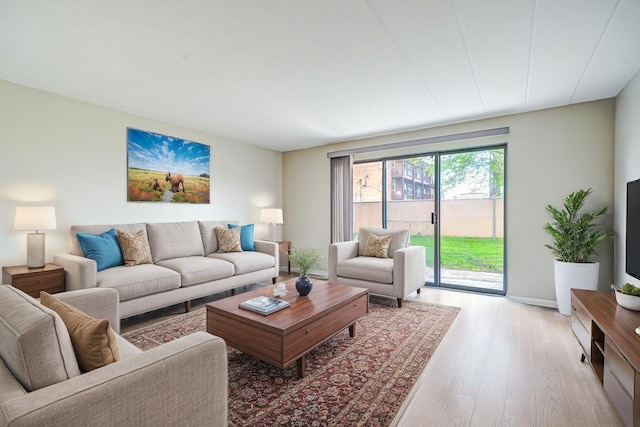 127 N Wolf Rd Unit 63A, Wheeling, IL 60090 - living room with light wood finished floors
