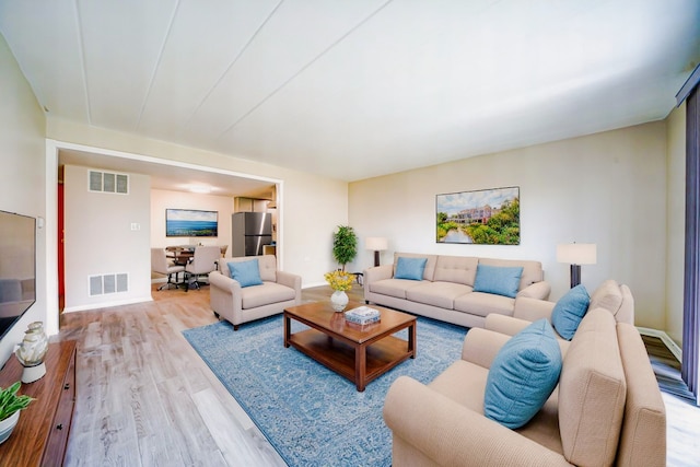 127 N Wolf Rd Unit 63A, Wheeling, IL 60090 - living area featuring wood finished floors and baseboards