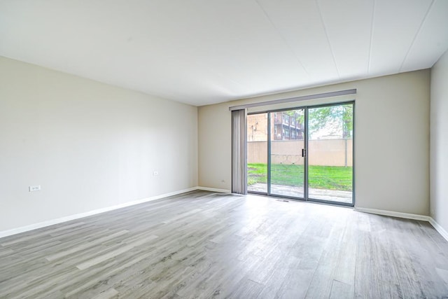 127 N Wolf Rd Unit 63A, Wheeling, IL 60090 - unfurnished room featuring light wood-type flooring and baseboards