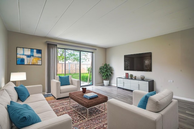 127 N Wolf Rd Unit 63A, Wheeling, IL 60090 - living room featuring wood finished floors and baseboards