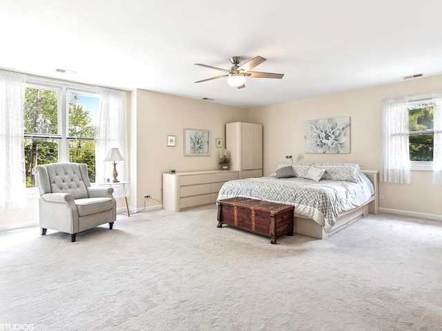9907 Kedvale Ave, Skokie, IL 60076 - carpeted bedroom with multiple windows and a ceiling fan