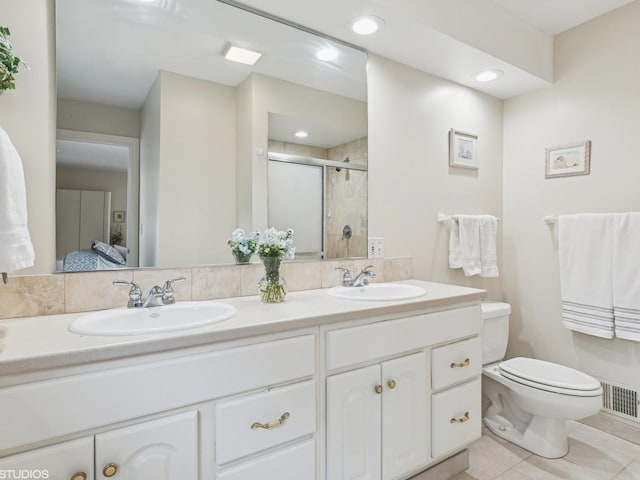9907 Kedvale Ave, Skokie, IL 60076 - bathroom featuring double vanity, a stall shower, connected bathroom, and tile patterned floors