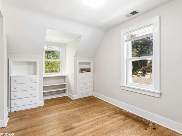 9907 Kedvale Ave, Skokie, IL 60076 - additional living space with lofted ceiling and light wood-style floors