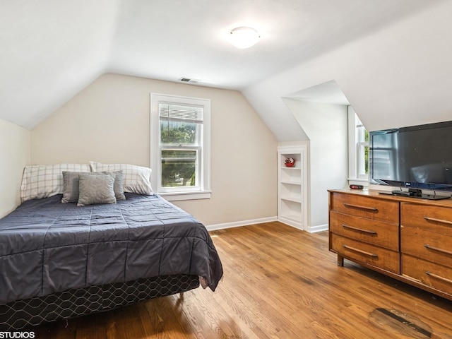 9907 Kedvale Ave, Skokie, IL 60076 - bedroom with light wood-type flooring and vaulted ceiling