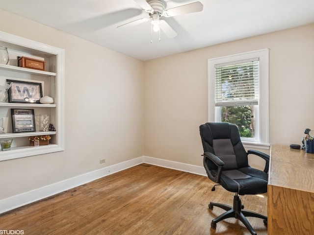 9907 Kedvale Ave, Skokie, IL 60076 - office with wood finished floors and a ceiling fan