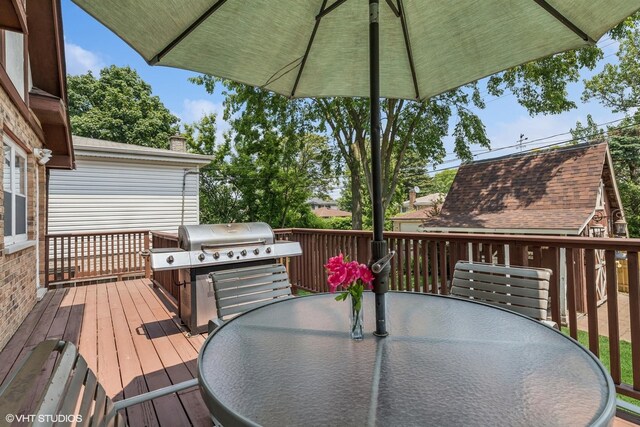 9907 Kedvale Ave, Skokie, IL 60076 - wooden terrace with outdoor dining space and grilling area