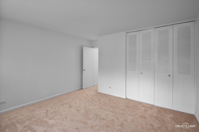 2151 Country Club Dr Unit 6, Woodridge, IL 60517 - unfurnished bedroom featuring carpet, a closet, and baseboards